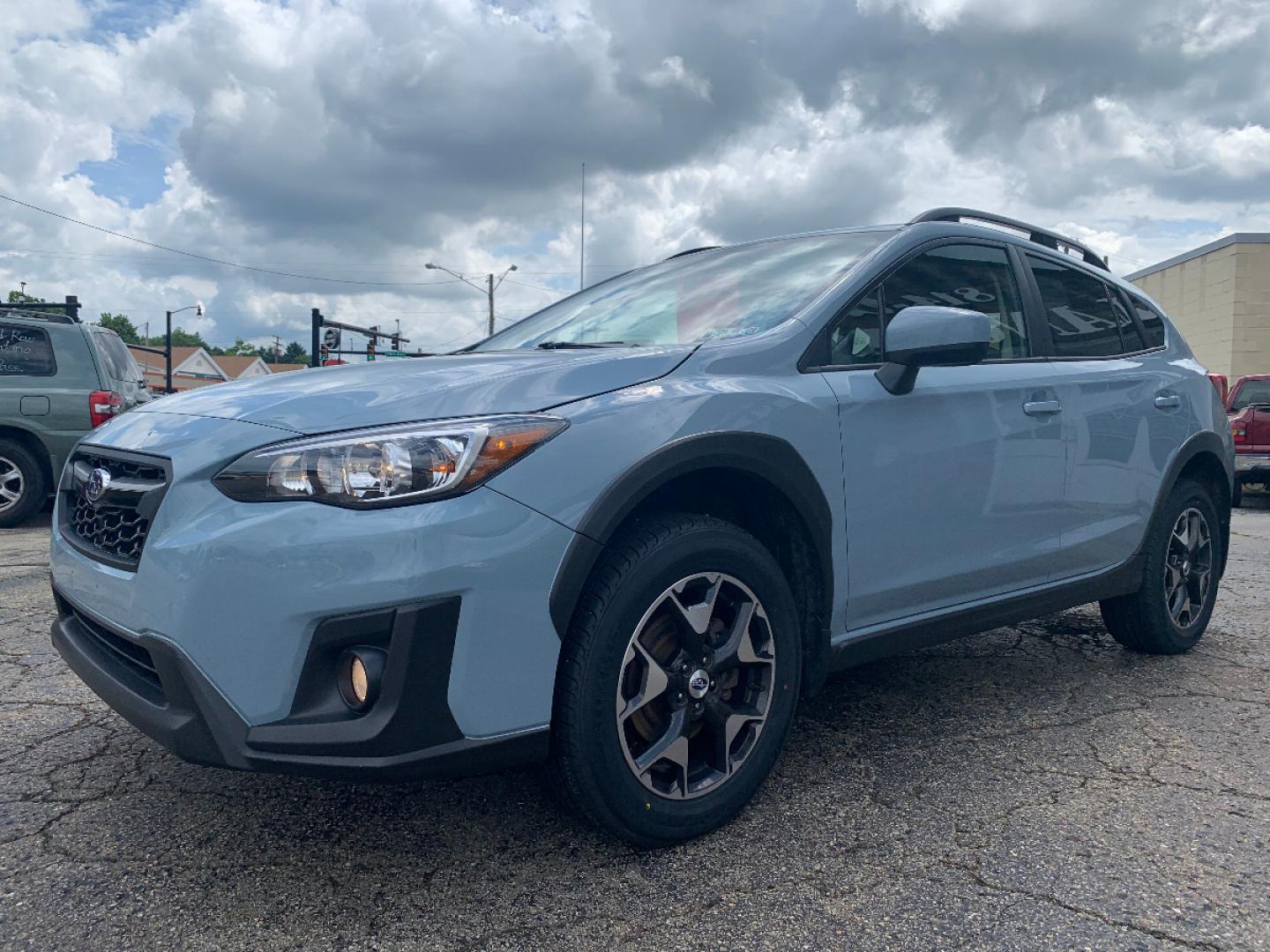 2018 Cool Gray Khaki /Black Subaru Crosstrek 2.0i Premium (JF2GTACC9J8) with an 2.0L L4 DOHC 16V engine, Automatic transmission, located at 821 Market Street, Meadville, PA, 16335, (814) 724-2500, 41.641064, -80.152435 - EXTREMELY clean, CARFAX 1-owner vehicle!! Power windows & locks, keyless entry, X-Mode, 17" alloy wheels, Subaru STARLINK Multimedia system with AUX/USB/BT, front/rear floor mats, fold down rear seats, privacy tinted rear windows, roof rack, rear backup camera, power moon roof, fog lamps, and NEW T - Photo#2